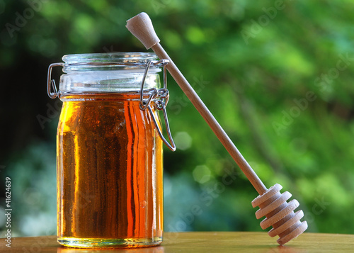 Photo: Jar of Honey with stir stick Jar of Honey with stir stick