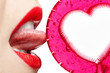 Foto: woman tasting lollipop woman tasting lollipop