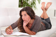 Woman writing in her diary