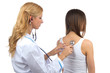 Doctor woman auscultating young patient by stethoscope