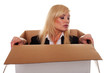 Scared young blonde emerging from a box