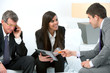 Business meeting with digital tablet.