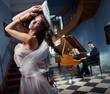 Sexy woman dancing to the piano music