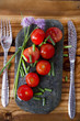 Cherry tomatoes on flat stone