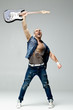 Guy holding a guitar