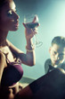 Sexy woman with glass of wine