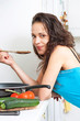 Young woman in kitchen