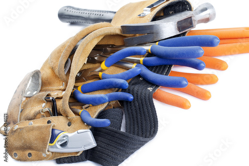 Photo: image of a tool belt isolated on white surface image of a tool belt isolated on white surface