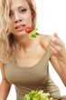 Woman with salad isolated on white