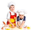 Photo: Two beautiful caucasian brothers making a cake Two beautiful caucasian brothers making a cake
