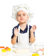 Beautiful caucasian boy making a cake