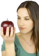 Girl watching big red apple Girl watching big red apple