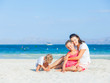 Happy family on tropical beach Happy family on tropical beach