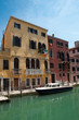 Photo: Colorful typical houses and canal at Venezia - Italy Colorful typical houses and canal at Venezia - Italy