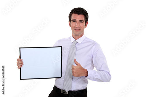 Foto: businessman making presentation at meeting businessman making presentation at meeting