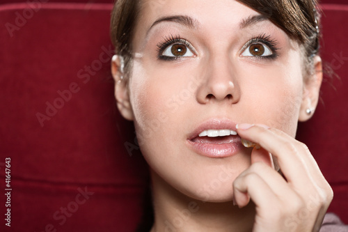 Photo: A woman watching a movie A woman watching a movie
