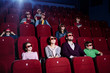 People in 3D movie theater People in 3D movie theater
