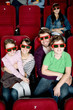 Happy family watching a movie Happy family watching a movie