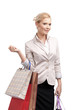 Business woman in a light beige suit holding shopping bags Business woman in a light beige suit holding shopping bags