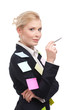 Smiling young business woman in a black suit holding pen Smiling young business woman in a black suit holding pen