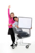 Children in a shopping trolley with a blank board