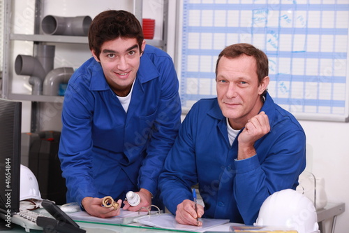 Photo: Two depot workers Two depot workers