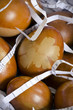 Decorated eggs with leaf pattern on shredded paper Decorated eggs with leaf pattern on shredded paper