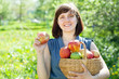 Happy woman with apple harvest Happy woman with apple harvest