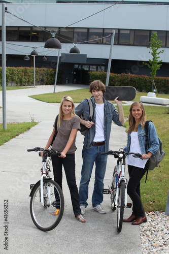 Photo: Young people with bicycles and skateboard Young people with bicycles and skateboard