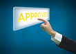 Business hand pointing approved word on button with world map