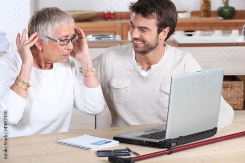 Photo: elderly woman using computer elderly woman using computer