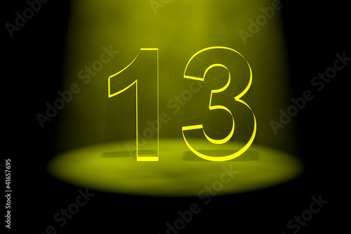 Illustration: Number 13 illuminated with yellow light Number 13 illuminated with yellow light