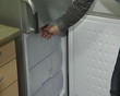 refrigerator cabinet drawer closing. product demonstration store