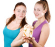 two happy beautiful girls holding a present