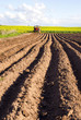 spring tillage in the ground and  tractor