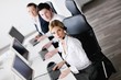 business people group working in customer and help desk office business people group working in customer and help desk office