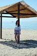 Dan under the hut by the sea
