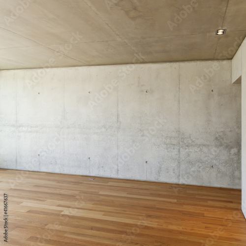Foto: modern house with hardwood floor, concrete wall modern house with hardwood floor, concrete wall
