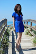 Asian girl  with the blue dress in the dunes 1