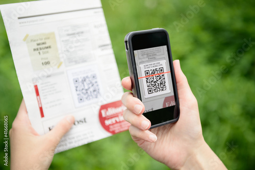 Photo: Scanning QR code on mobile phone Scanning QR code on mobile phone