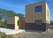 Photo : Construction d'une maison individuelle avec bardage bois Construction d'une maison individuelle avec bardage bois