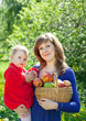 family with harvested apples family with harvested apples