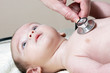 Stethoscope listening to a baby's heart beat