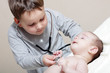 Stethoscope listening to a baby's heartbeat