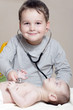 Stethoscope listening to a baby's heartbeat