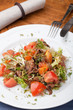 Tofu marinated in soy sauce with tomato and salad Tofu marinated in soy sauce with tomato and salad