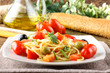 Spaghetti with fresh tomatoes, olives and mint