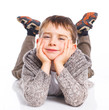 Photo: Cute boy lying on floor Cute boy lying on floor