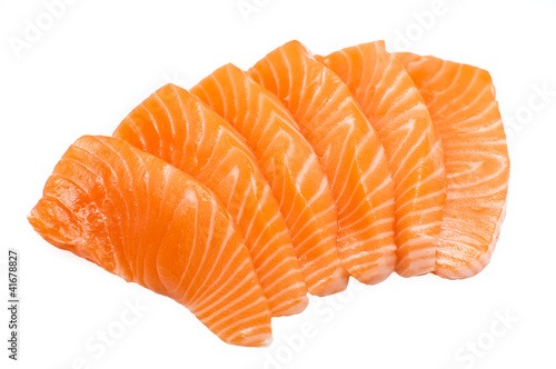 Photo: Sliced raw fatty salmon isolated on white Sliced raw fatty salmon isolated on white