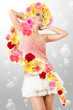 Young girl in pink clothing with flowers
